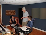 (left to right) Ilona Kudina, Don Hunerberg, and Ron Artinian collaborate on Nothing But Illusion.